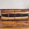 LUMINA Silvan – Sideboard aus Nussbaum & Epoxidharz